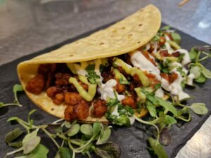 2025-ChefMomo TACO "El amor no duele y si duele no es amor" Tapa de Chef Momo